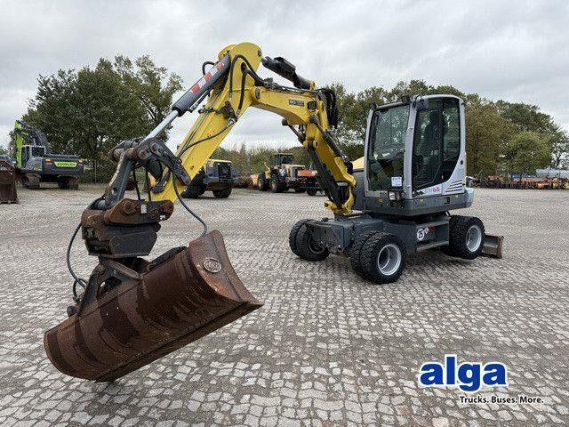 Neuson EW65, Verstellausleger, Hydr. S.W.S.,Div. Löffel - Excavadora de ruedas: foto 1 Neuson EW65, Verstellausleger, Hydr. S.W.S.,Div. Löffel - Excavadora de ruedas: foto 1