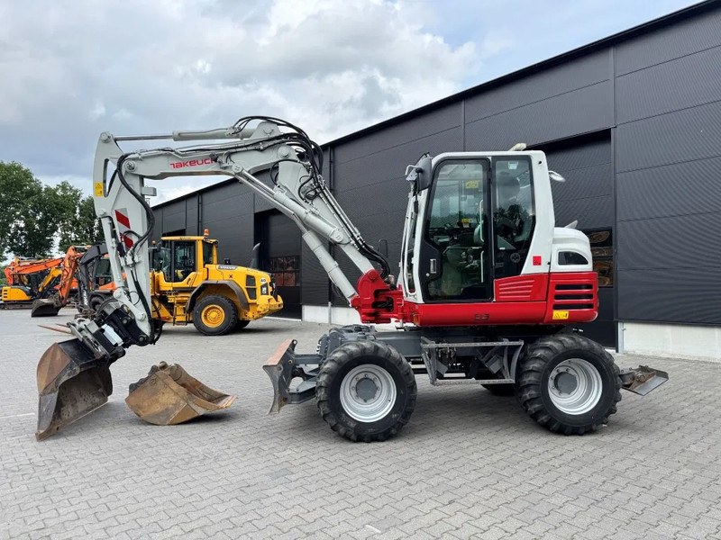 Takeuchi TB295W BJ 2021 3500 uur Compacttilt Draaikantelstuk met Gripper ! - Excavadora de ruedas: foto 1 Takeuchi TB295W BJ 2021 3500 uur Compacttilt Draaikantelstuk met Gripper ! - Excavadora de ruedas: foto 1
