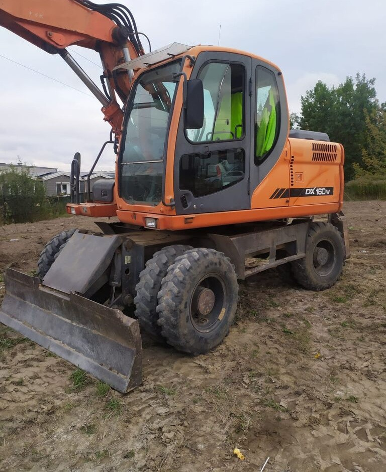 Doosan DX160 w - Excavadora de ruedas: foto 1 Doosan DX160 w - Excavadora de ruedas: foto 1