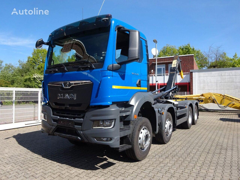 MAN TGS 35.510 Hook lift truck 8x4 - Camión multibasculante: foto 1 MAN TGS 35.510 Hook lift truck 8x4 - Camión multibasculante: foto 1