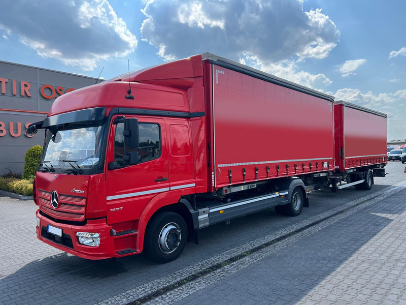 Mercedes-Benz ATEGO 1227 BDF WECHSELFAHRGESTELL CURTAIN PLANE TRAILER 1.HAND - Camión lona: foto 2 Mercedes-Benz ATEGO 1227 BDF WECHSELFAHRGESTELL CURTAIN PLANE TRAILER 1.HAND - Camión lona: foto 2