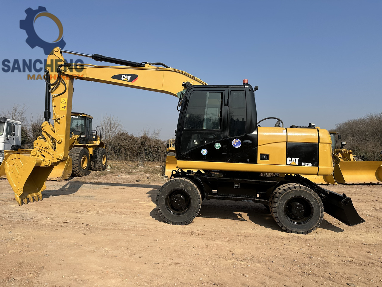 CATERPILLAR M320D2 - Excavadora de ruedas: foto 2 CATERPILLAR M320D2 - Excavadora de ruedas: foto 2