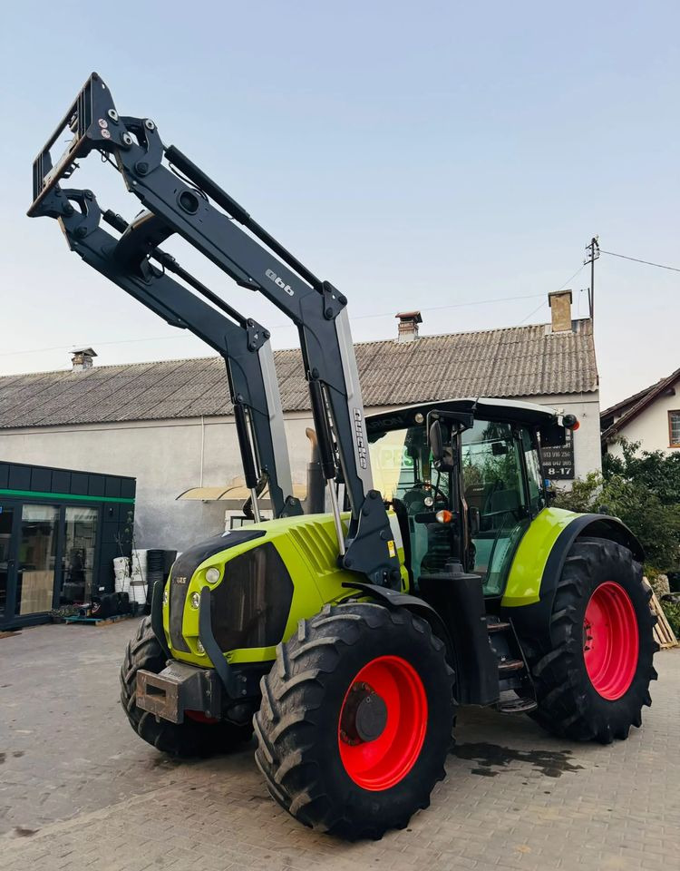 Claas Arion 650 - Tractor: foto 1 Claas Arion 650 - Tractor: foto 1