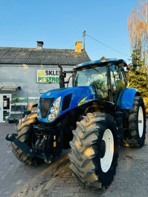 New Holland T7030 - Tractor: foto 1 New Holland T7030 - Tractor: foto 1
