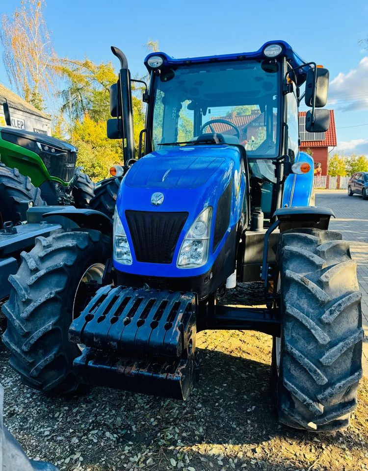New Holland TD5.95 - Tractor: foto 1 New Holland TD5.95 - Tractor: foto 1