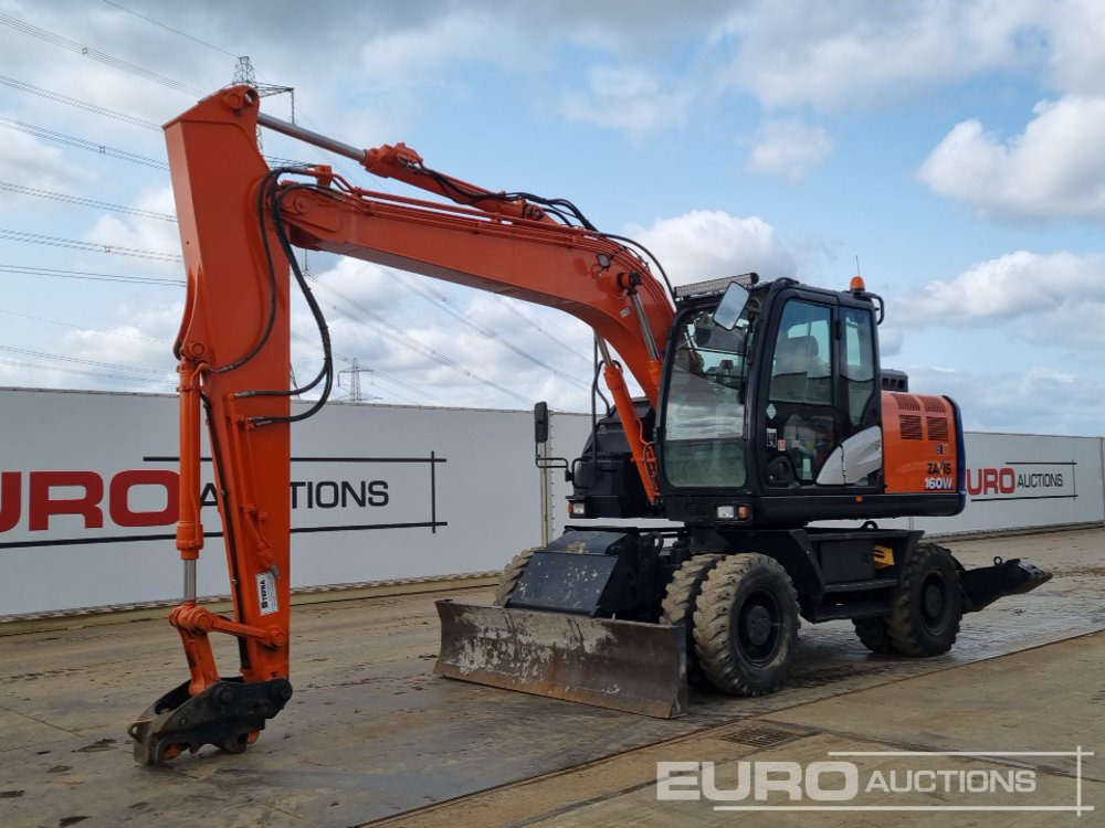 Hitachi ZX140W-6 - Excavadora de ruedas: foto 1 Hitachi ZX140W-6 - Excavadora de ruedas: foto 1