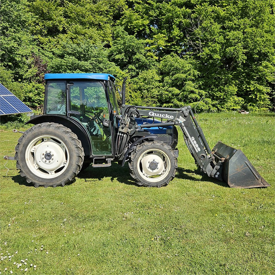 New Holland TN55D - Tractor: foto 2 New Holland TN55D - Tractor: foto 2