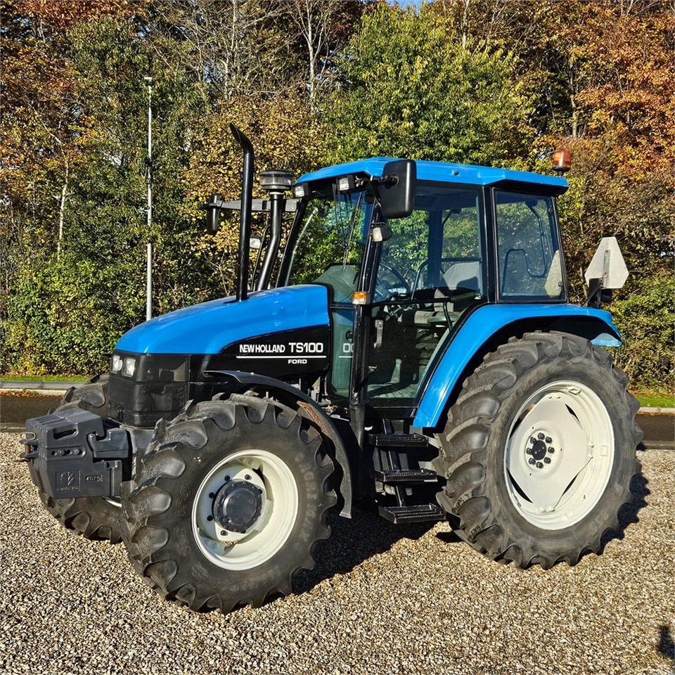 New Holland TS 100 - Tractor: foto 1 New Holland TS 100 - Tractor: foto 1
