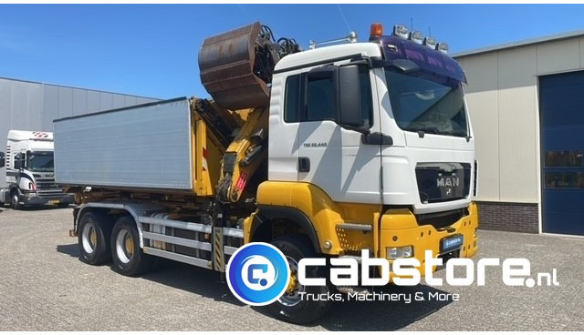 MAN TGS 26.440 6X6 BB EEV MAN TGS 26.440 Euro 5 EEV - 6X6 - Laadkraan - Kipper - Kabelsysteem - Bouwjaar 2010 - Km 657.509 - APK tot 22-11-2025 !! - Camión volquete, Camión grúa: foto 1 MAN TGS 26.440 6X6 BB EEV MAN TGS 26.440 Euro 5 EEV - 6X6 - Laadkraan - Kipper - Kabelsysteem - Bouwjaar 2010 - Km 657.509 - APK tot 22-11-2025 !! - Camión volquete, Camión grúa: foto 1